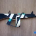 Full view of cardboard AA-12 shotgun with drum mag
